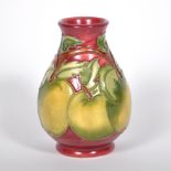 A Moorcroft Pottery vase, 'Apples' design, 1997