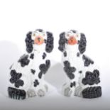 A pair of Victorian Staffordshire pottery King Charles Spaniels, 28cm.