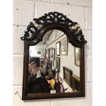 A walnut wall mirror, with 17th Century style