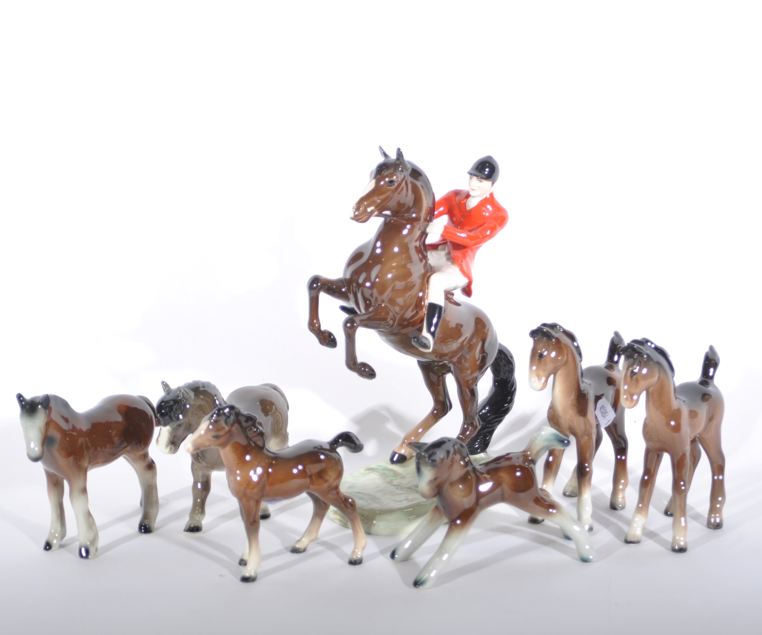 Beswick model of a Huntsman on a rearing horse, 25cm