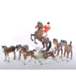 Beswick model of a Huntsman on a rearing horse, 25cm