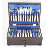 Six-place chrome plated canteen of cutlery, in an oak case..