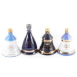 Twelve boxed bottles of Bells whisky in Royal Commemorative decanters