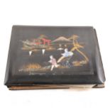 A Japanese black lacquer album of photographs of a World Cruise circa 1939