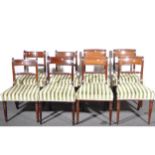 A set of six Regency style mahogany and brass inlaid dining chairs, rope tw