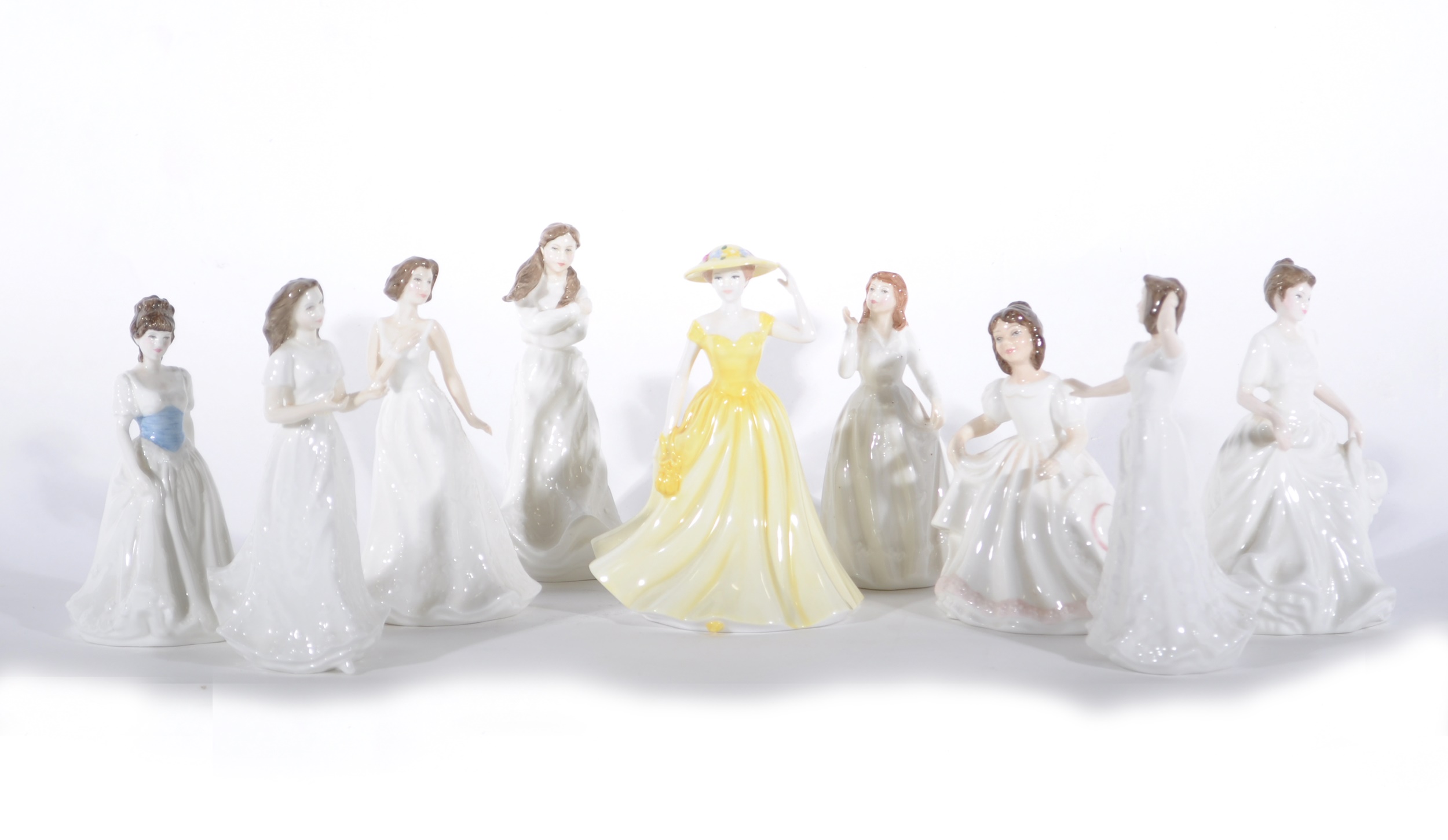 A Royal Doulton figure, Springtime, HN4586; and eight other Royal Doulton C