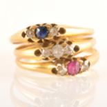 Three joined dress rings, set with sapphires, diamonds and rubies, each a t