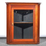 A Victorian mahogany hanging corner cupboard, glazed panelled door, depth 4