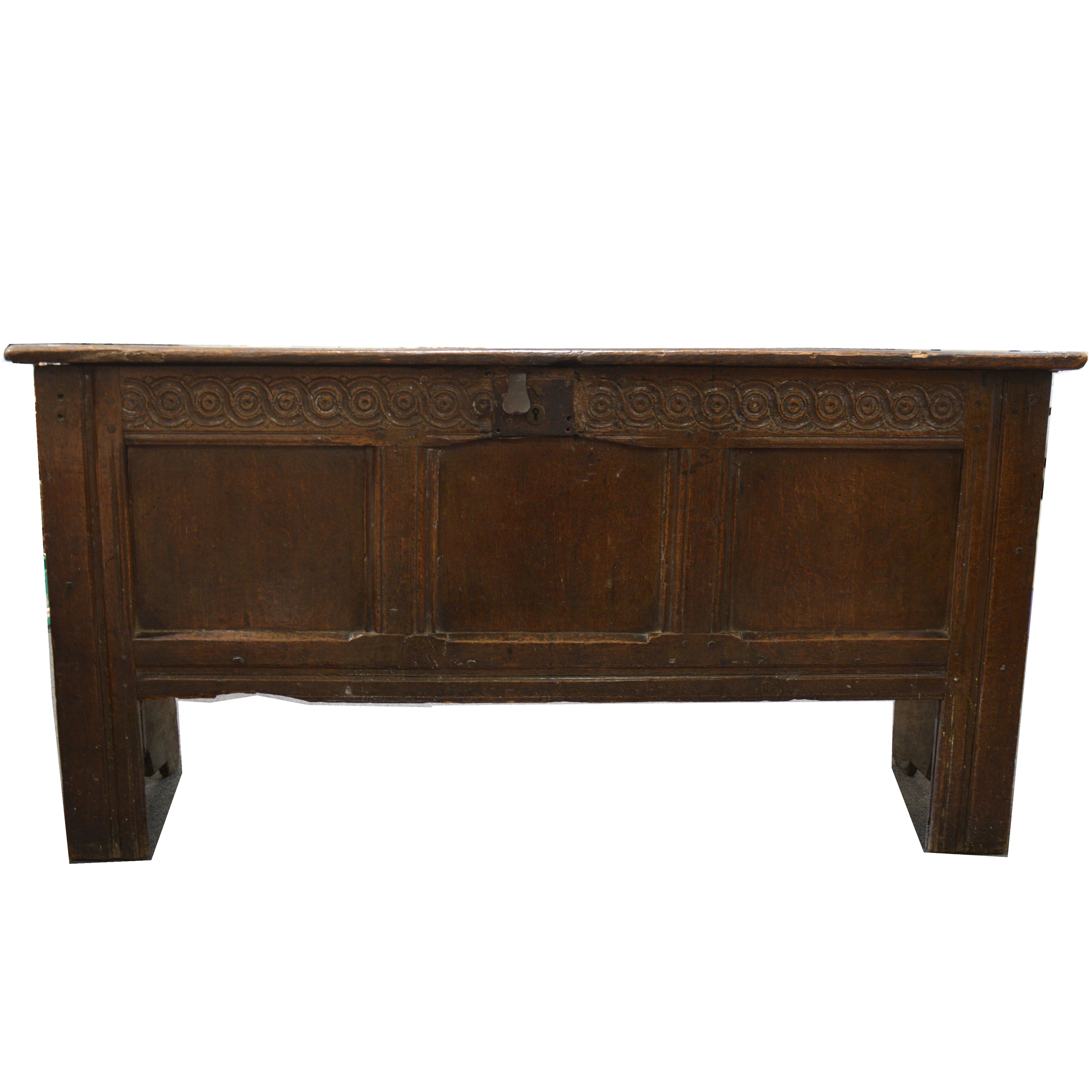 An oak coffer, 18th Century, rectangular hinged boarded top, the front with