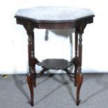 An Edwardian stained wood window table, octagonal top with a shaped and mou