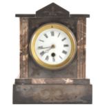 A Victorian slate and marble mantel clock, architectural form with a circul