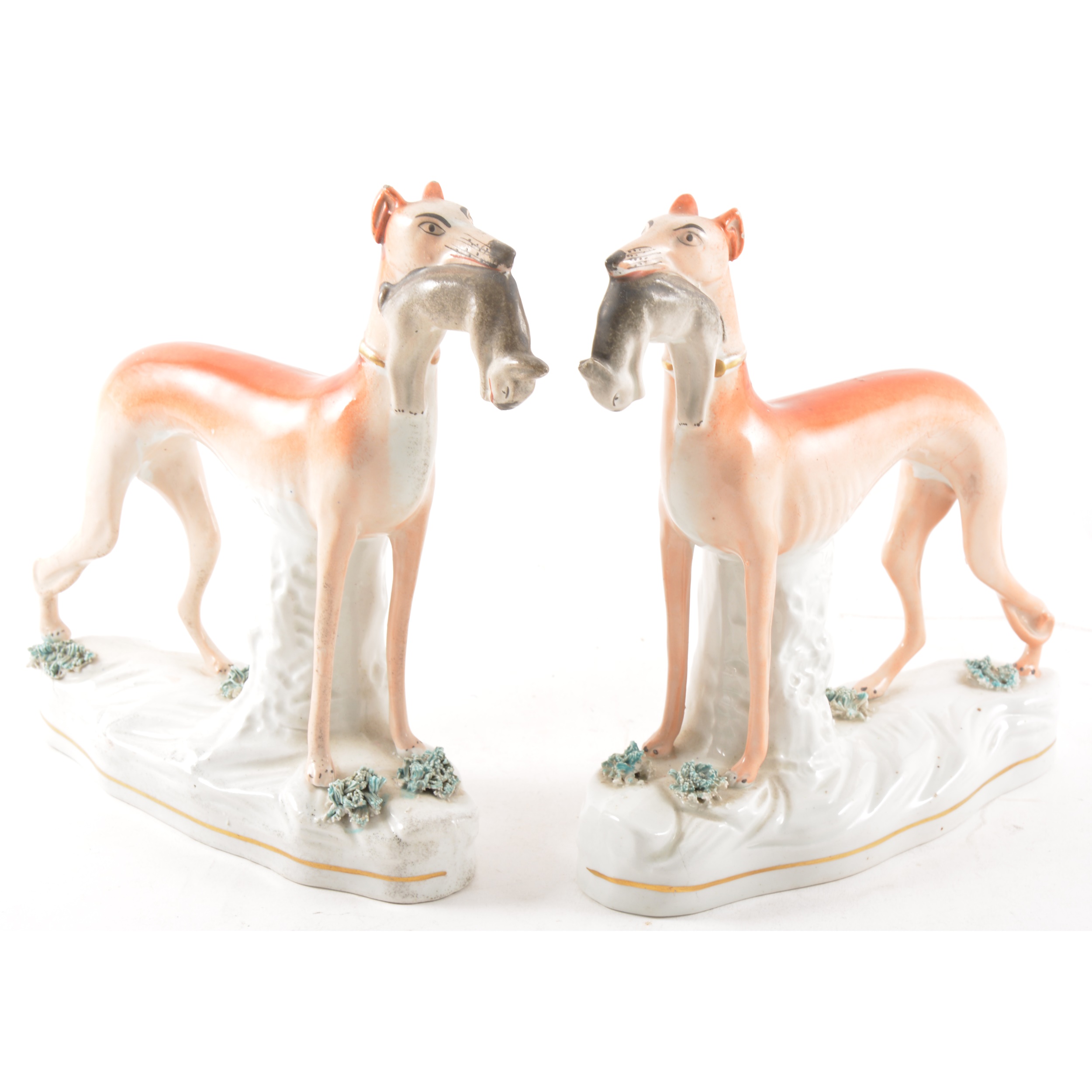 A pair of Staffordshire pottery models, Greyhound and Hare, 20cm.