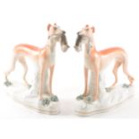 A pair of Staffordshire pottery models, Greyhound and Hare, 20cm.