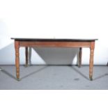 A mahogany extending dining table, with one additional leaf, rounded rectan