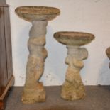 Two figural birdbaths, reconstituted stone, 85cm and 65cm.
