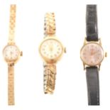 Baume - a lady's 9 carat yellow gold bracelet watch, circular cream baton d