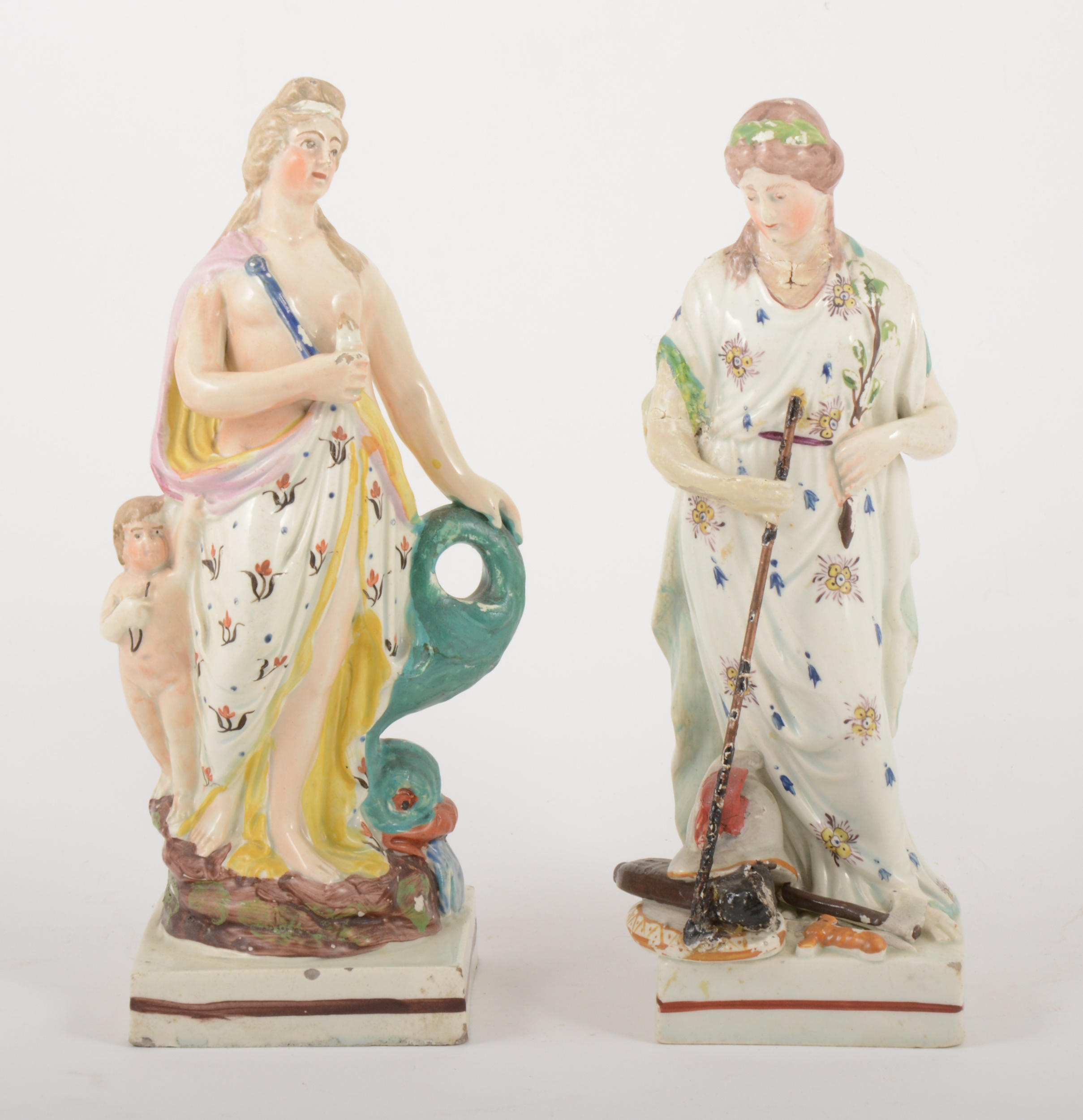 A Staffordshire earthenware figure of Venus with Cupid, in the manner of En