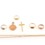 A quantity of gold rings and chain necklaces, yellow metal cross marked 9ct