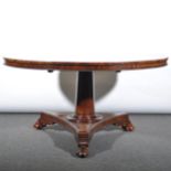 A Regency mahogany breakfast table, circular tilt top, with segmentary vene