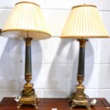 A pair of reproduction candlestick lamp bases, simulated stone columns, lio