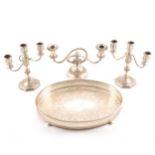 A pair of plated three-light candelabra, hexagonal bases, 21cm; two-light c