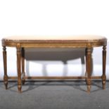 A Louis XVI style gilt gesso duet stool, carved frieze, raised on turned an