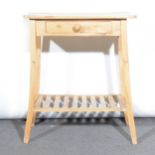 A stripped elm side table, single frieze drawer, splayed supports joined by
