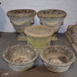 A pair of garden urns, fruiting swags to the exterior, diam 48cm, height 50