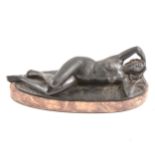 After Moret, reclining female nude, bronze on an oval marble plinth, 29cm.
