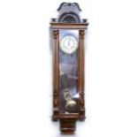 A walnut cased Vienna wall clock, double weight driven movement, 148cm.