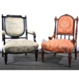 Two Victorian armchairs, one with ebonised frame with green patterned uphol