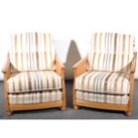 An Ercol three piece bergere suite, two seater settee and two easy chairs u