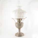 A steel oil lamp, large moulded opaque glass shade (damages), fitment stamp