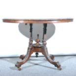 A Victorian walnut supper table, oval top with marquetry inlay, moulded edg