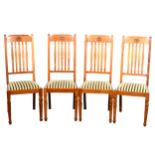 A set of six oak dining chairs by Shapland & Petter of Barnstaple, the top