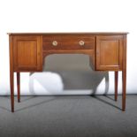 An Edwardian mahogany sideboard, rectangular top, fitted with a drawer flan