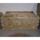 A pair of garden troughs, with classical mask borders, length 72cm, width 2