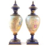 A pair of Sevres style pedestal vases, painted decoration with a couple, si