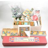 Britains Toys plastic figures, including knights, cowboys, farm pigs, and The Tournament Collection