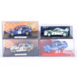 Four slot-car racing models; including SCX Ford Escort MkII