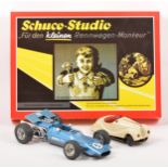 Three Schuco wind-up tin-plate toys; including Studio Studeo set; no.1050 Mercedes no.6 etc