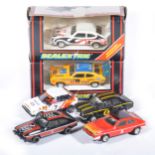 Six Scalextric slot-car racing models.