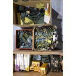 A large quantity of plastic military toy soldiers, vehicles and buildings
