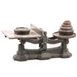 Set of cast iron scales with weights.