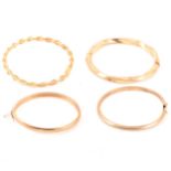 Four modern gold bangles.