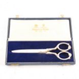 Maples, Mappin & Webb - a pair of silver handled presentation scissors.