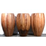 Three large lacquered wood planters,