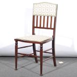An Edwardian inlaid mahogany bedroom chair