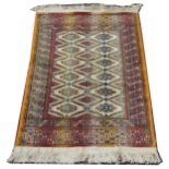 Three Persian pattern small rugs
