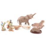 Eight assorted animal figures and groups.